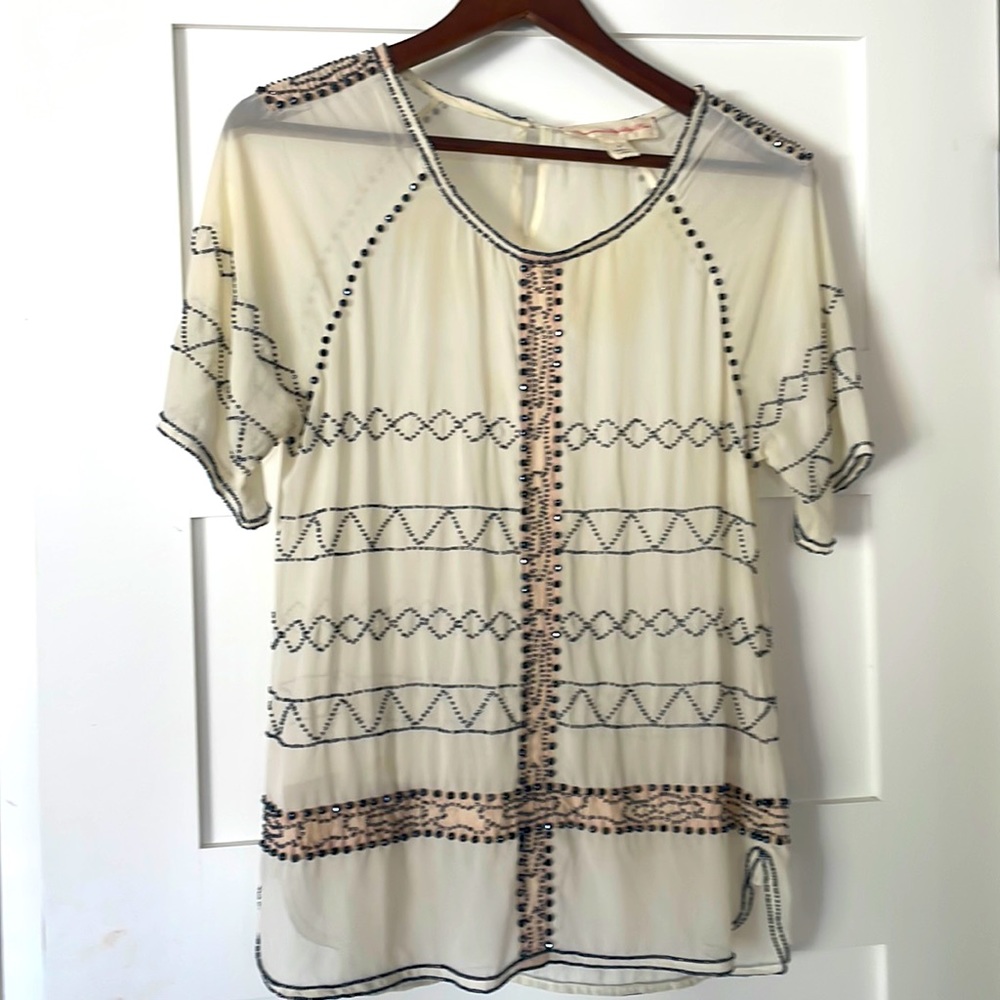 Blouse with embellishments
